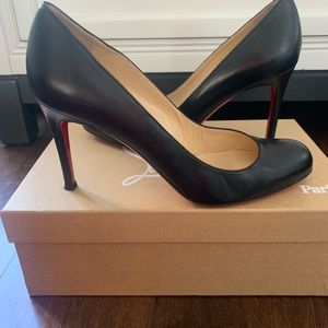 Christian Louboutin simple black pump in good condition.
